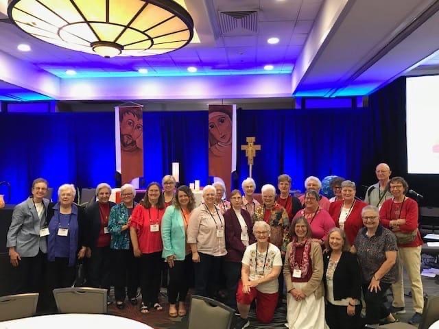 Sara, the newly appointed executive director of the Franciscan Federation, in a large group photograph taken at AFC 2022 with the Sisters of St. Francis of Philadelphia and their companions.
